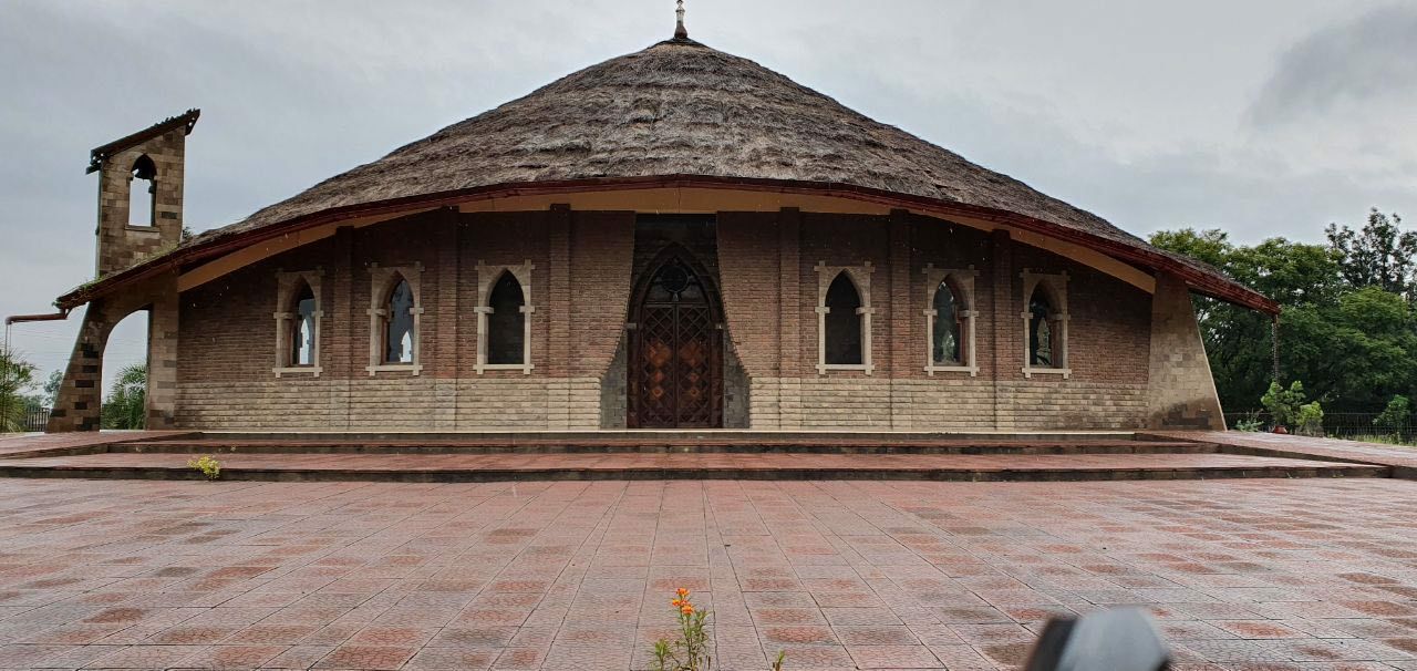 Church building with traditional thatched roof — Cherenet work
